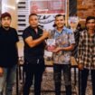 Penulis meyerahkan buku kepada beberapa narasumber. Foto: Istimewa