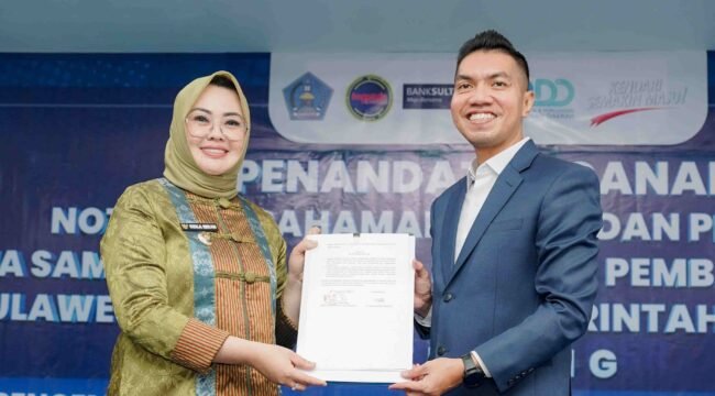 Walikota Kendari, Siska Karina Imran (kiri) dan Direktur UtamaPT Bank Sultra, Andri Permana Diputra Abubakar. Foto: Istimewa.