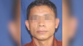 Pria inisal SU (46) ditangkap polisi diduga gasak uang tunai di sebuah BRI Link di Kendari. Foto: Istimewa