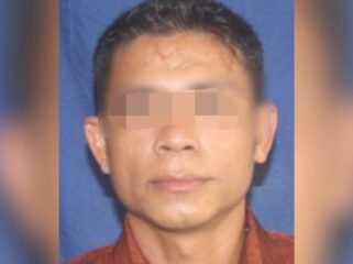 Pria inisal SU (46) ditangkap polisi diduga gasak uang tunai di sebuah BRI Link di Kendari. Foto: Istimewa