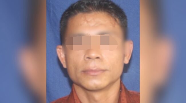 Pria inisal SU (46) ditangkap polisi diduga gasak uang tunai di sebuah BRI Link di Kendari. Foto: Istimewa