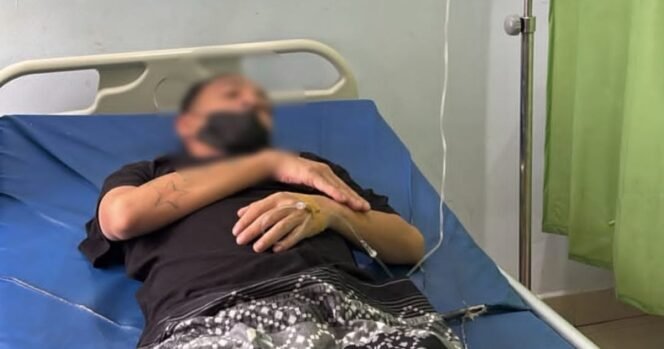 
 Tersangka kasus pencabulan anak tiri di Kota Kendari insial AYP (42) saat menjalani perawatan. Foto: Istimewa
