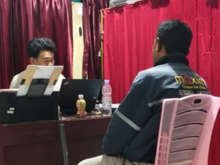 Seorang driver ojek online (ojol), inisial LM (43) saat melapor di Polresta Kendari. Foto: Istimewa