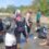 Hilang Kendali di Tikungan, Mobil Minibus Terjun ke Sungai dan Empat Penumpang Luka-luka