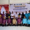 Tim Dosen PKM FKIP Unkhair berpose bersama anak binaan LKPA Kelas II Ternate usai pelatihan musik tradisional. Foto: Istimewa